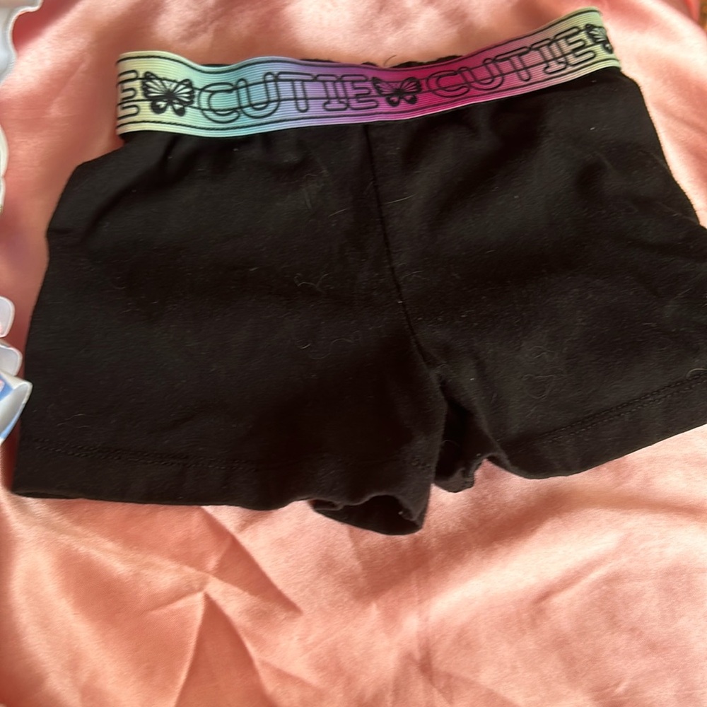 3t swim suit and a pair of shorts